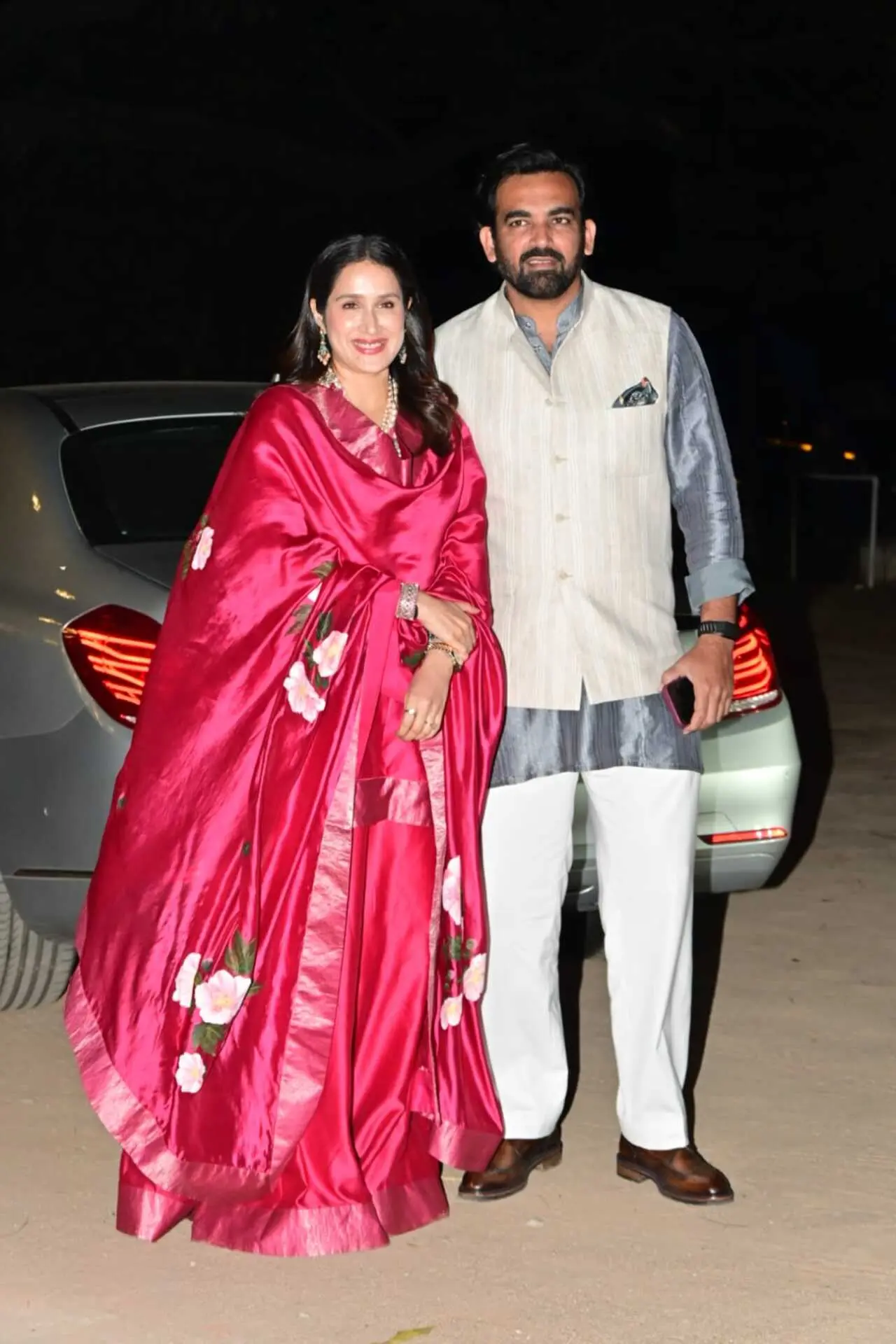 Sagarika Ghatge and Zaheer Khan made a stylish appearance at the mehendi ceremony. Sagarika turned heads in a vibrant pink silk suit adorned with floral motifs, while Zaheer complemented her in a classic kurta.